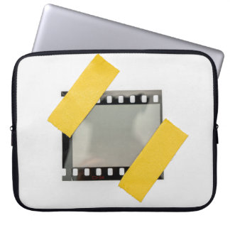 Empty 35mm film frame, yellow strips. laptop sleeve