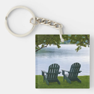Empty Adirondack Chairs facing a Lake Key Ring