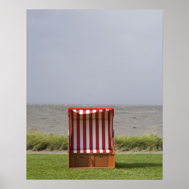 empty beach chair in front of sea poster (Front)
