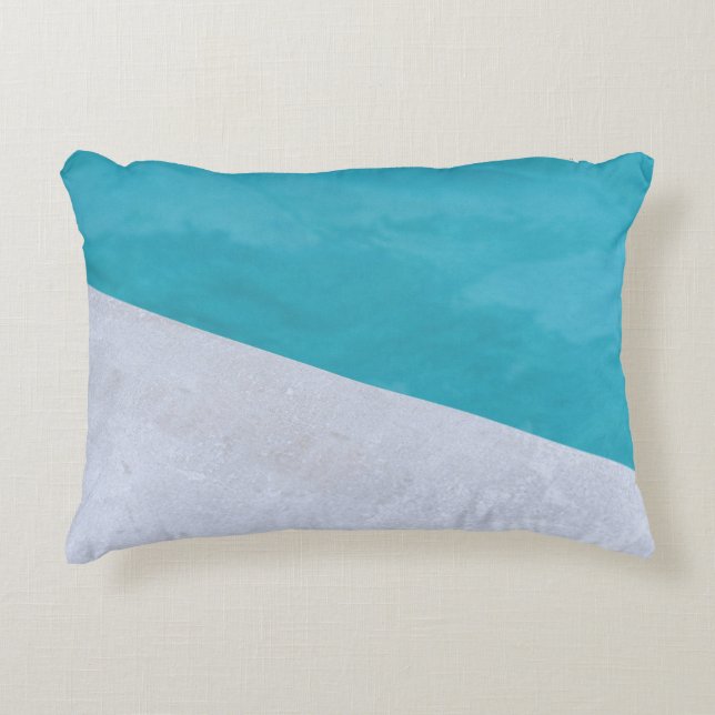 Empty gray floor beside pool decorative cushion (Front)