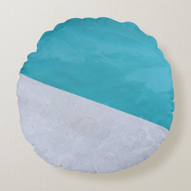 Empty gray floor beside pool round cushion (Front)