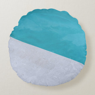 Empty gray floor beside pool round cushion