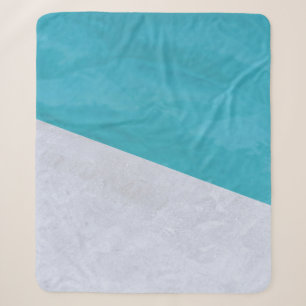 Empty gray floor beside pool sherpa blanket