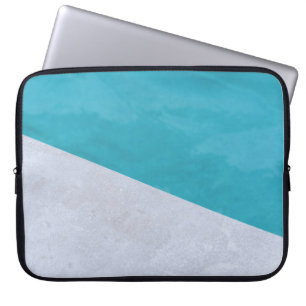 Empty grey floor beside pool laptop sleeve