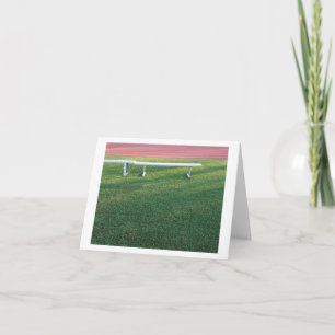 Empty Metal Bench on Sports Field Card