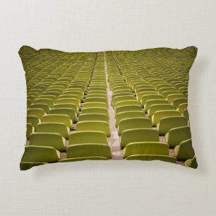 Empty yellow chair lot decorative cushion