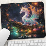 Enchanted Forest Dragon Personalised Mouse Pad<br><div class="desc">Transform your workspace into a magical realm with this enchanting mouse pad featuring a majestic dragon nestled within an ethereal forest. The vibrant colours and intricate details bring the scene to life, inspiring creativity and wonder. The smooth surface ensures precise mouse movements while the non-slip backing keeps it securely in...</div>