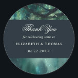 Enchanted Forest Magical Garden Dark Wedding Favou Classic Round Sticker<br><div class="desc">A whimsical watercolor illustration of lush foliage in emerald green, sparkling with fairy lights and magic dust, decorates this elegant, simple, classy and modern wedding favour thank you sticker with an enchanted forest theme. Luxurious but simple, classic but chic, modern but timeless. An elegant, modern wedding sticker for a fairytale...</div>