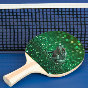 Enchanting Emergence: The Green Sparkle Frog Ping Pong Paddle
