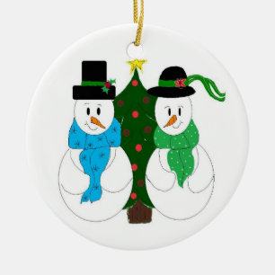Enchanting Snow Couple Trimmed in Green Ceramic Ornament
