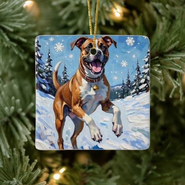 Energetic Boxer Dog Leaping in Winter Snow Fun Ceramic Ornament (Tree)