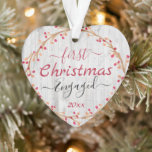 Engaged Couple First Christmas Rustic Wood Ornament<br><div class="desc">Hand painted watercolor branches and berries on a faux wood textured background. Just a little touch of rustic country! Celebrate your first Christmas as an engaged couple with this one photo option keepsake.</div>