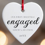 Engaged Personalised Engagement Gift For Christmas Ceramic Ornament<br><div class="desc">Celebrate your engagement with our Engaged Personalised Engagement Gift For Christmas Ceramic Ornament. This elegant, minimal, and clean design in classic black and white is the perfect addition to your Christmas tree ornaments, capturing the essence of a simple, minimalist Christmas. Customised with your names and the engagement date, this custom...</div>