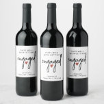 Engagement Wine Label Engagement Gift<br><div class="desc">Pairs well with getting engaged,  engagement gift wine label to give to the engaged couple on a perfect bottle of red wine or two,  or three!. This label sports a modern script type and a little red heart.</div>