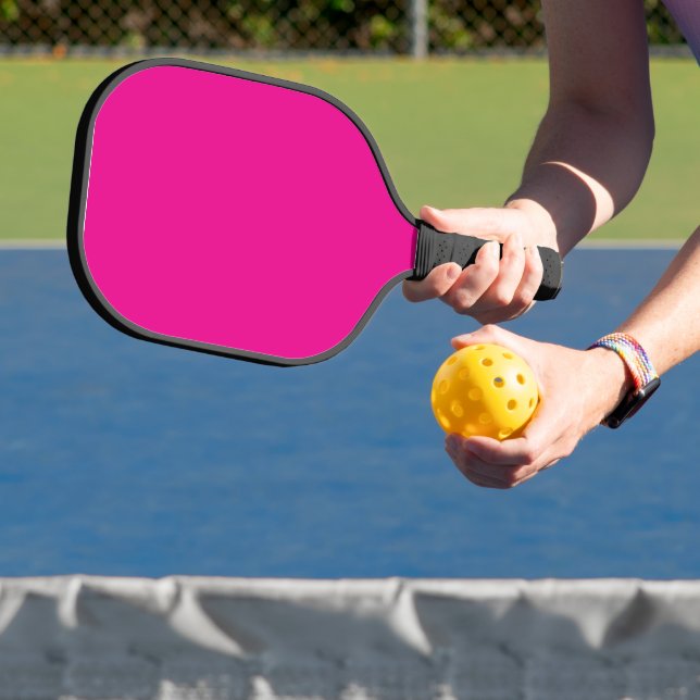 Enhance Your Space with a Pink Background Pickleball Paddle (Insitu)