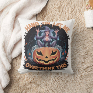 Enigmatic witch pondering atop a pumpkin at dusk cushion