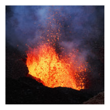 Eruption active volcano - hot lava flow in crater