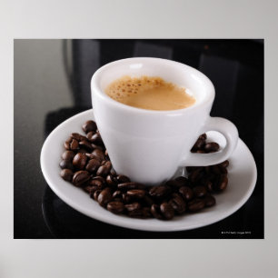Espresso cup on black granite counter poster