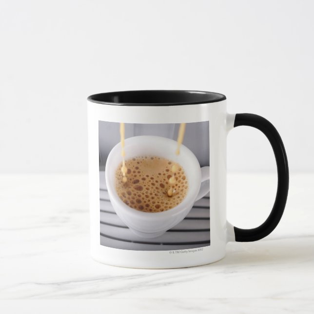Espresso pouring into cup (Right)