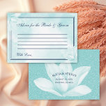 Ethereal Crystal Blue Magnolia , Wedding Advice Card<br><div class="desc">Wedding Advice Card featuring a delicate crystal blue magnolia flower over an abstract floral background in the same tint along with title: "Advice for the Bride and Groom" in an elegant calligraphy script, surrounded by two thin borders. On the backside are your names , date, city and state over a...</div>