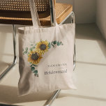 Eucalyptus Floral Sunflower Bridesmaid Favour Tote Bag<br><div class="desc">Sunflower Eucalyptus Leaves Script Bridesmaid tote bag featuring a modern layout and typography. Easily repurpose this for other special events or wedding party,  including the flower girl,  maid of honour,  bride's mum and more</div>
