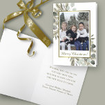 Eucalyptus & Golden Pine Merry Christmas Photo Holiday Card<br><div class="desc">This holiday card is festive, unique, and beautiful. It features a gorgeous design with your photo in a golden faux foil frame surrounded by hand painted watercolor pine branches and eucalyptus leaves in shades of sage green and gold. The editable caption reads Merry Christmas, and there is space for a...</div>