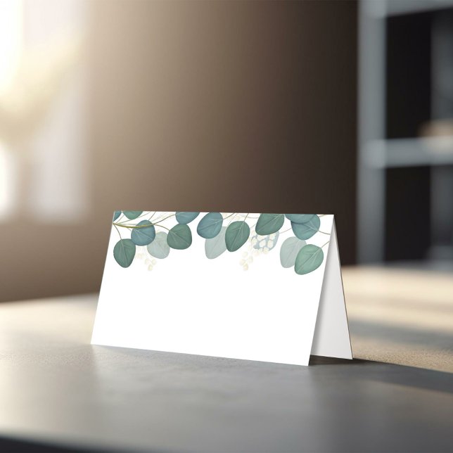 Eucalyptus Greenery Blank Wedding Place Cards (Elegant eucalyptus greenery wedding place card styled on reception table with candle and glassware.)