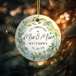 Eucalyptus Newlyweds 1st Christmas Mrs & Mrs Ceramic Ornament<br><div class="desc">For the Mrs. and Mrs. Lesbian Newlyweds. Customise the text and background colour for your event. Eucalyptus watercolor wreath can be scaled or removed. Photo on back.</div>