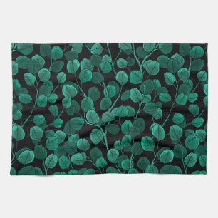 Eucalyptus on black tea towel
