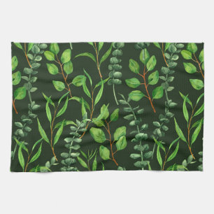 Eucalyptus on dark green tea towel