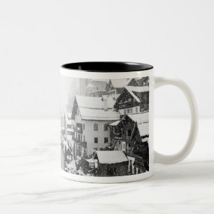 Europe, Austria, Hallstat. Town view in the snow Two-Tone Coffee Mug
