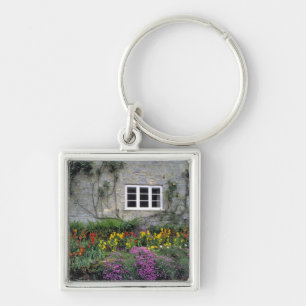 Europe, England, Teffont Magna. Flowers fill Key Ring