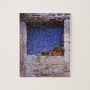 Europe, France, Cereste. A blue door adds colour Jigsaw Puzzle
