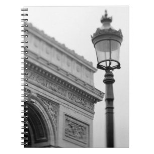 Europe, France, Paris. Arc de Triomphe and Notebook
