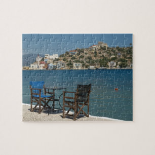 Europe, Greece, Kastellorizo: chairs on the edge Jigsaw Puzzle