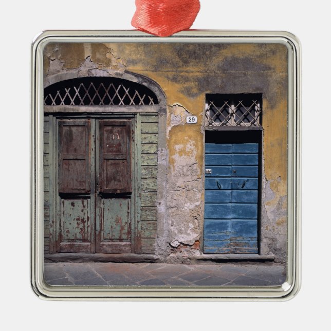 Europe, Italy, Lucca. These old doors add Metal Ornament (Front)