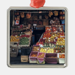 Europe, Italy, Venice area. Colourful fruits and Metal Ornament