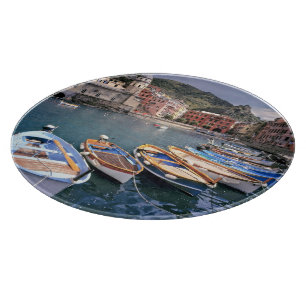 Europe, Italy, Vernazza. Brightly painted boats Cutting Board
