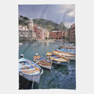 Europe, Italy, Vernazza. Brightly painted boats Tea Towel