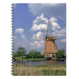 Europe, Netherlands, Kinerdijk. A windmill sits Notebook