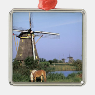 Europe, Netherlands, Zuid Holland, Kinderdijk. 2 Metal Tree Decoration