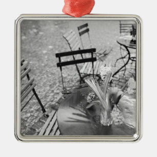 Europe, Switzerland, Lucerne. Outdoor cafe table Metal Tree Decoration