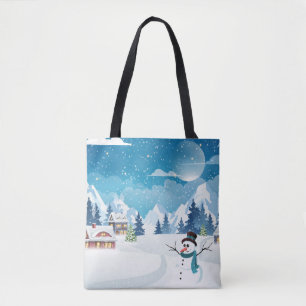 Evening village winter landscape with snow covered tote bag