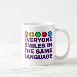 EVERYONE SMILES IN THE SAME LANGUAGE COFFEE MUG