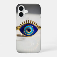 Evil Eye Gold Ring on Marble Background