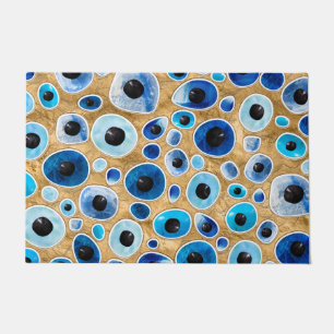 Evil Eye Pattern Tumbled Stones on gold Doormat