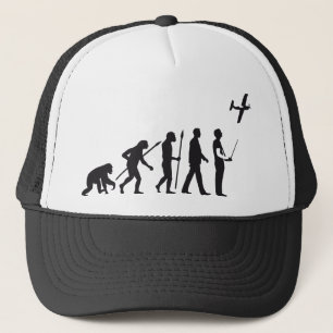 evolution of man controling model airplane trucker hat