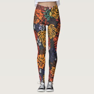 Exotic leaves on denim, seamless print. leggings