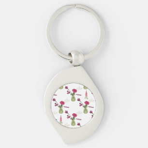 Exotisches Blumenarrangement im Glas Key Ring