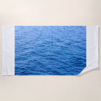  expanse of sea on Beach Towels